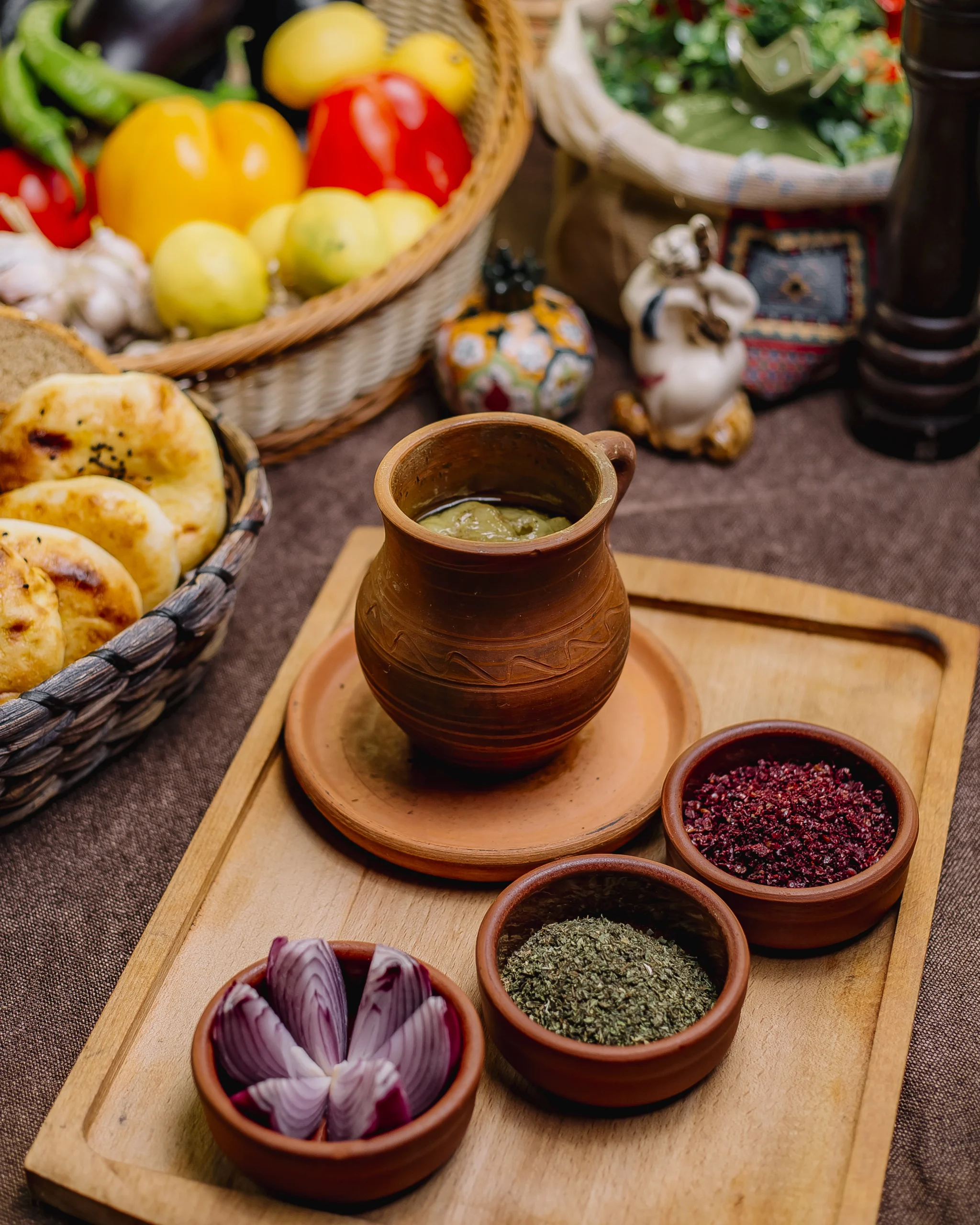 Byzantine recipes featuring lagana flatbread, honey cakes, and savory porridge on a rustic wooden table.