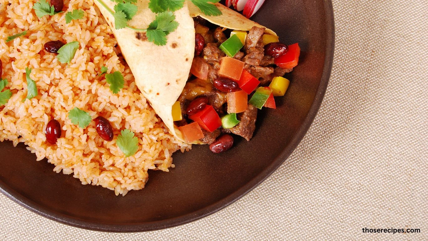 A bowl of taco rice topped with ground beef, lettuce, tomatoes, cheese, and salsa.