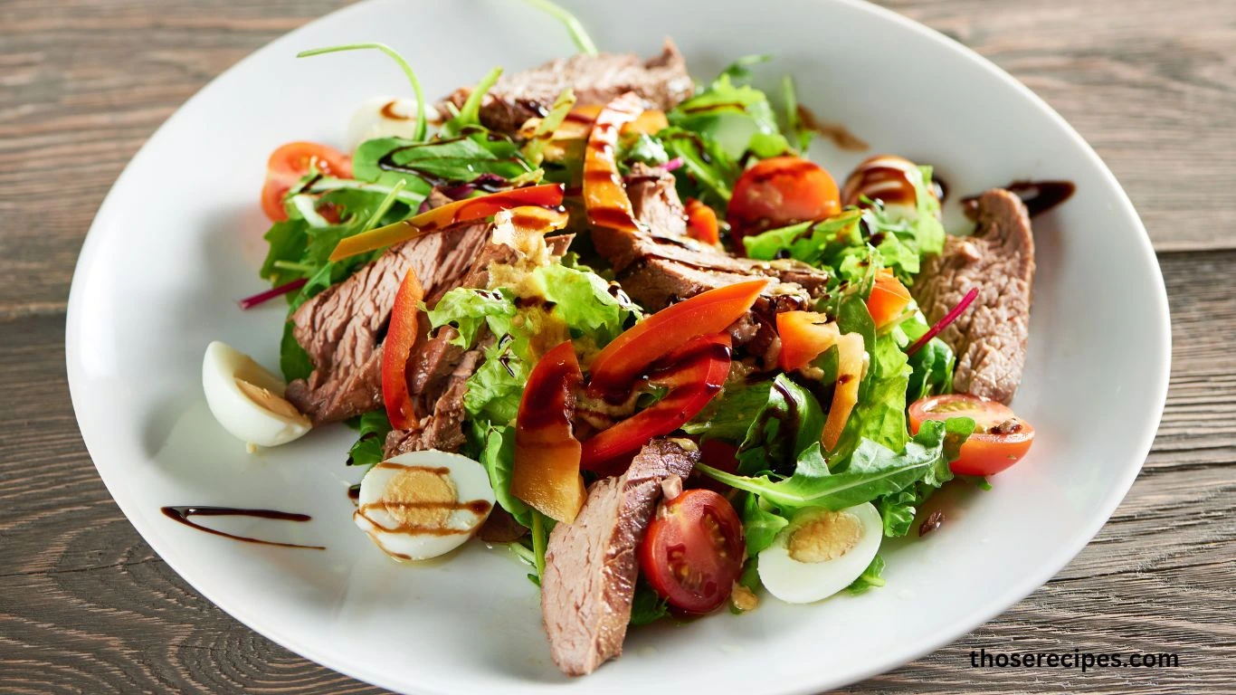 Mixing shredded chicken and dressing for a Chicken Salad.