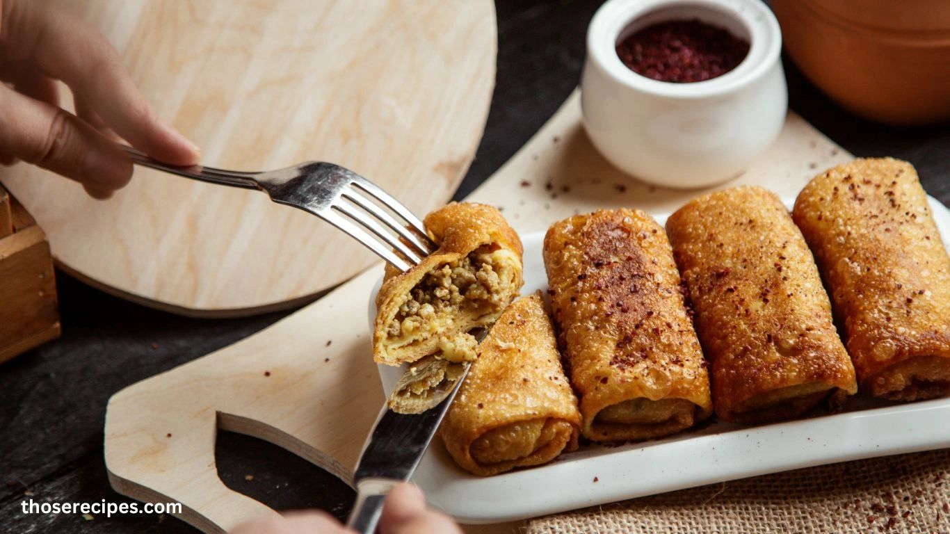 veggie egg roll recipe including cabbage, carrots, bean sprouts, garlic, and egg roll wrappers.