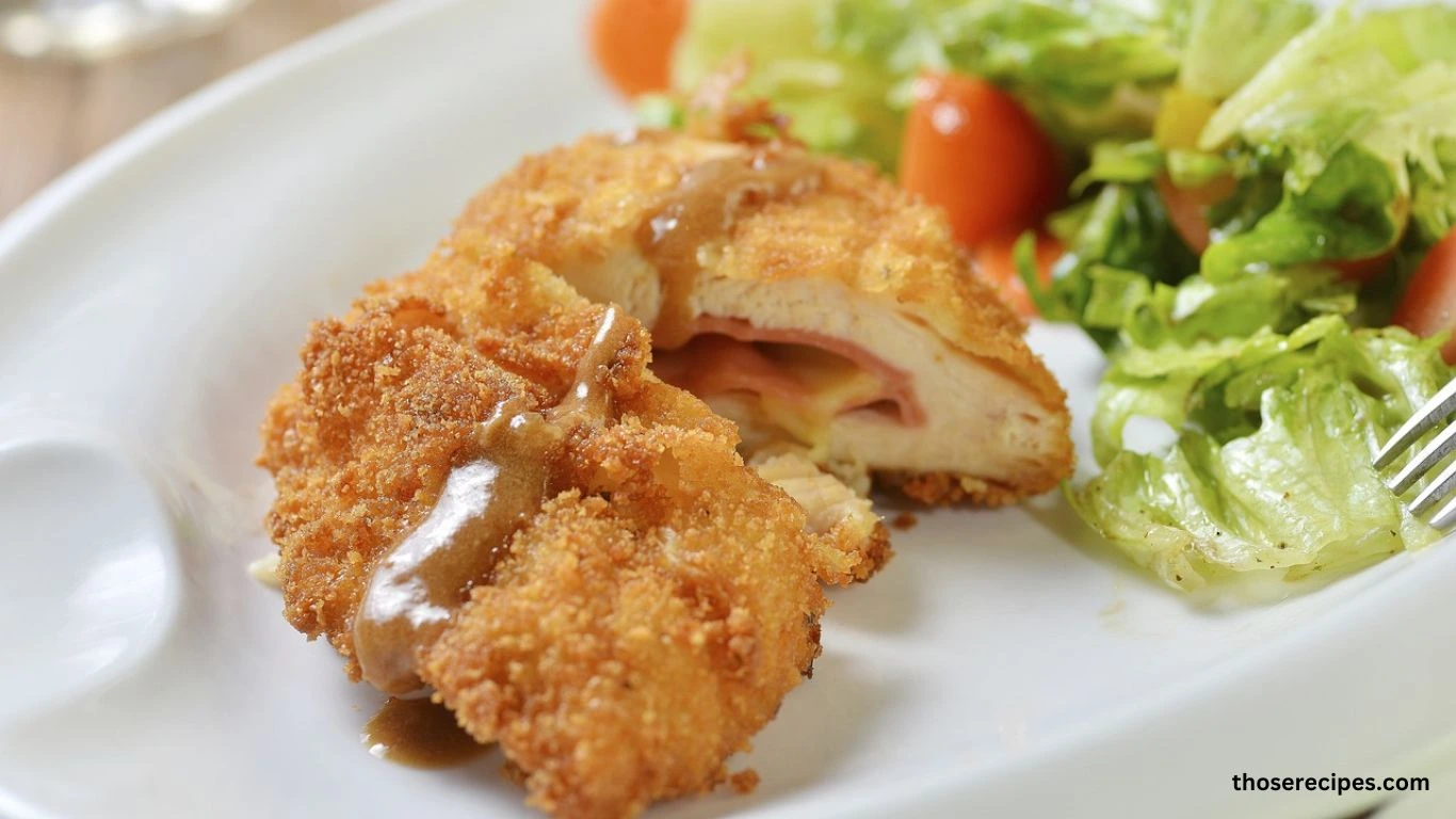 A freshly baked chicken and dressing recipe in a casserole dish.